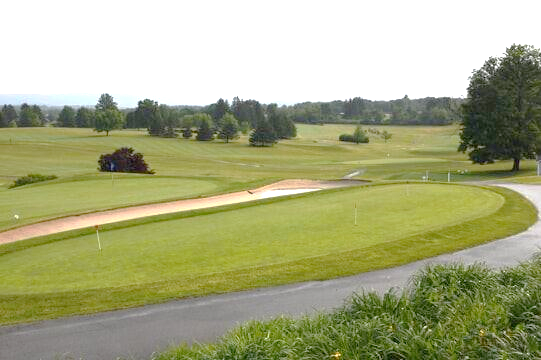 A golf course with a path